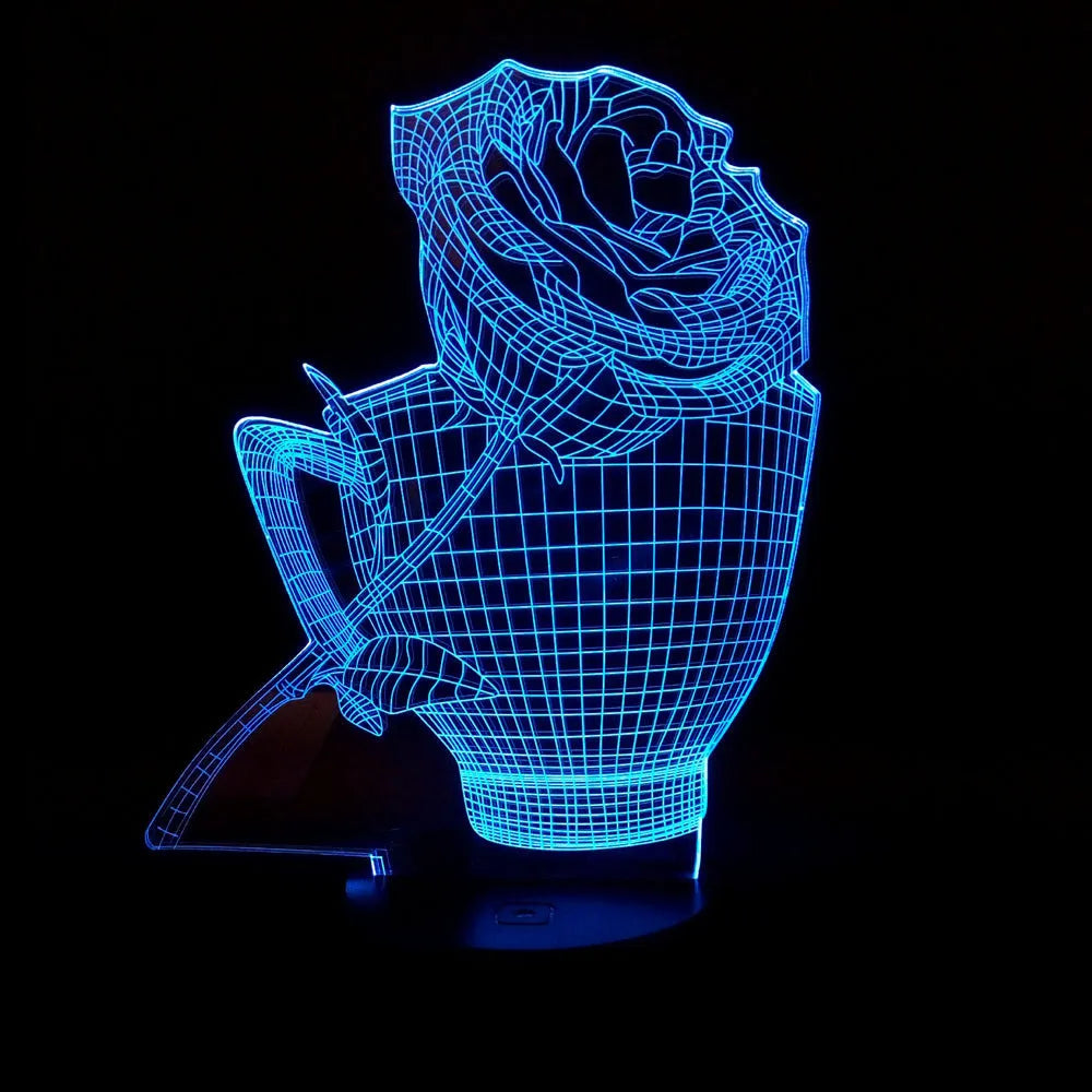 3D rose-shaped LED night light showing colour-changing glow on acrylic panel with ABS base.