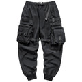 Men's black multi pocket cargo pants in polyester, loose fit, mid-waist style, on white background
