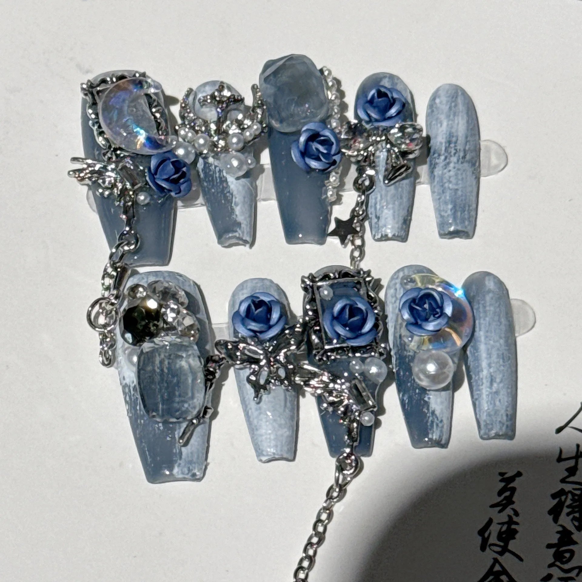 Heavy industry blue evening gloves with twinkling rose and tulip floral pattern showing full hand coverage