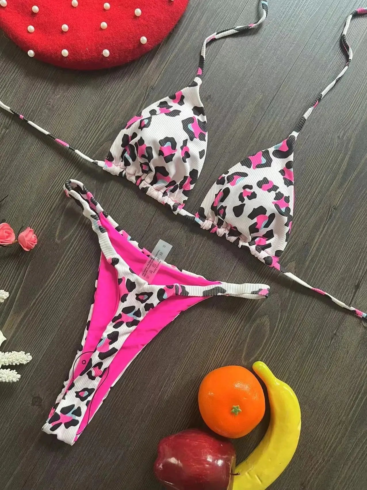Women's printed bikini swimsuit with cotton lining on mannequin showing briefs style