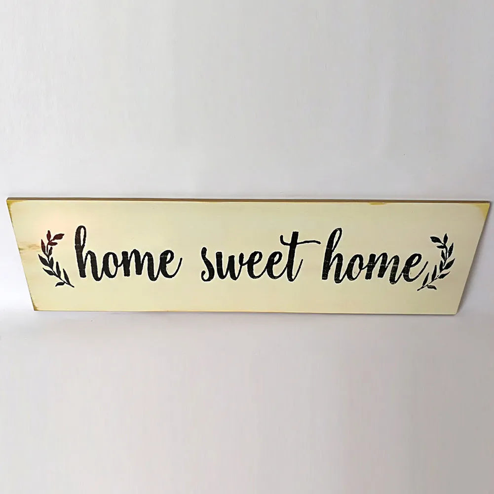 Carved wooden wall hanging pendant decoration in black or white, measuring 40cm long.