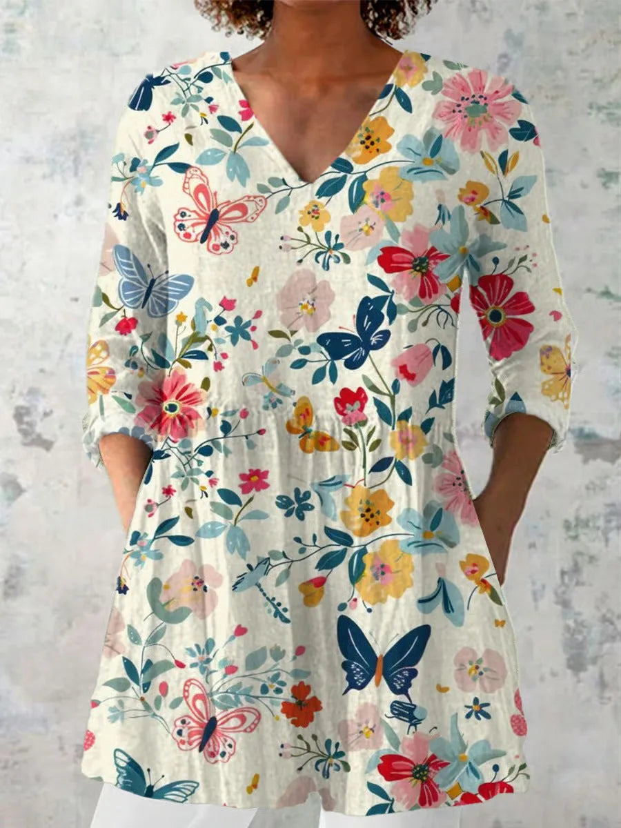 Women's retro slim fit printed long-sleeved top in a floral pattern, showing front view.