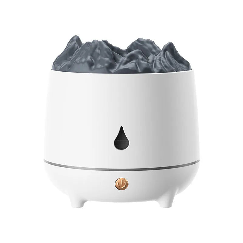 White Huoyanshan volcanic-shaped ultrasonic humidifier and aromatherapy diffuser on a table.