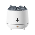 White Huoyanshan volcanic-shaped ultrasonic humidifier and aromatherapy diffuser on a table.