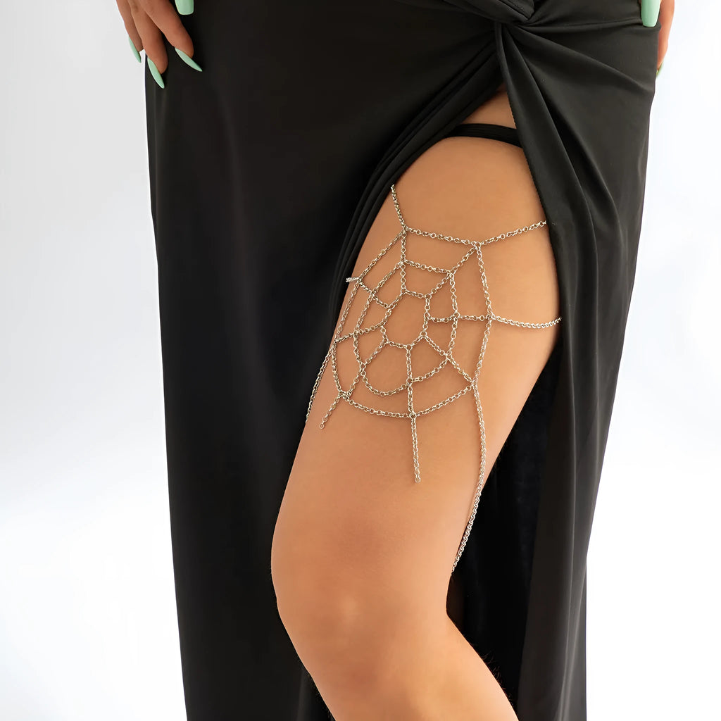 Women's simple geometric body chain in silver electroplated alloy, shown as an anklet