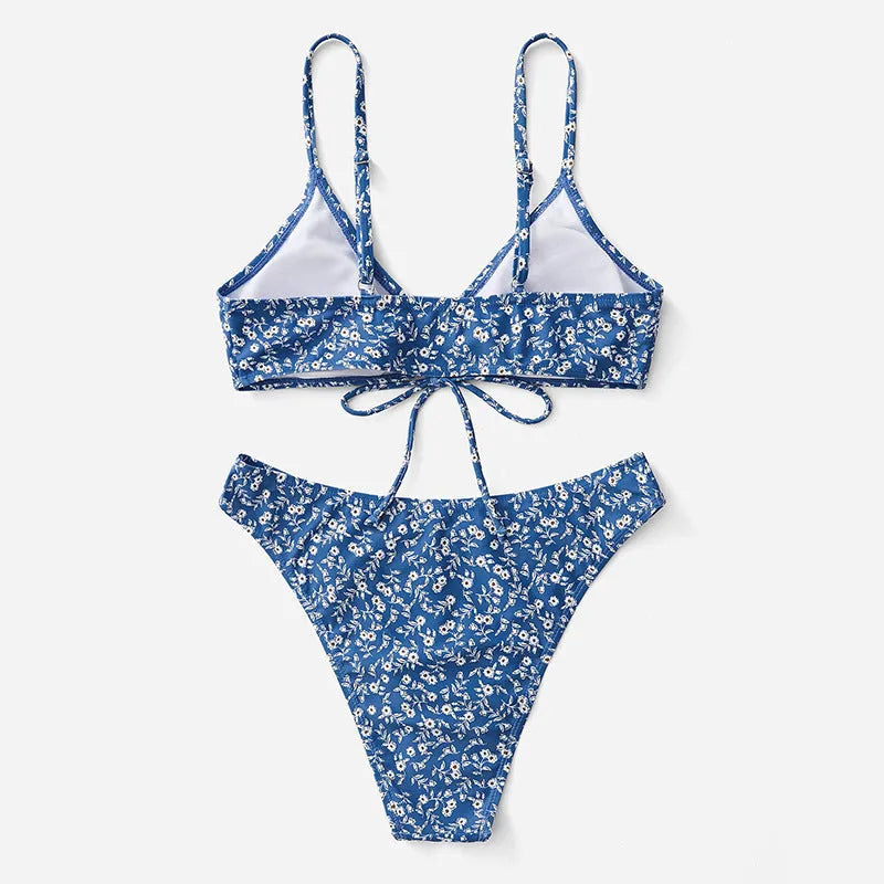 Blue polyester three-piece swimsuit set without steel rings, includes bikini top and shorts.
