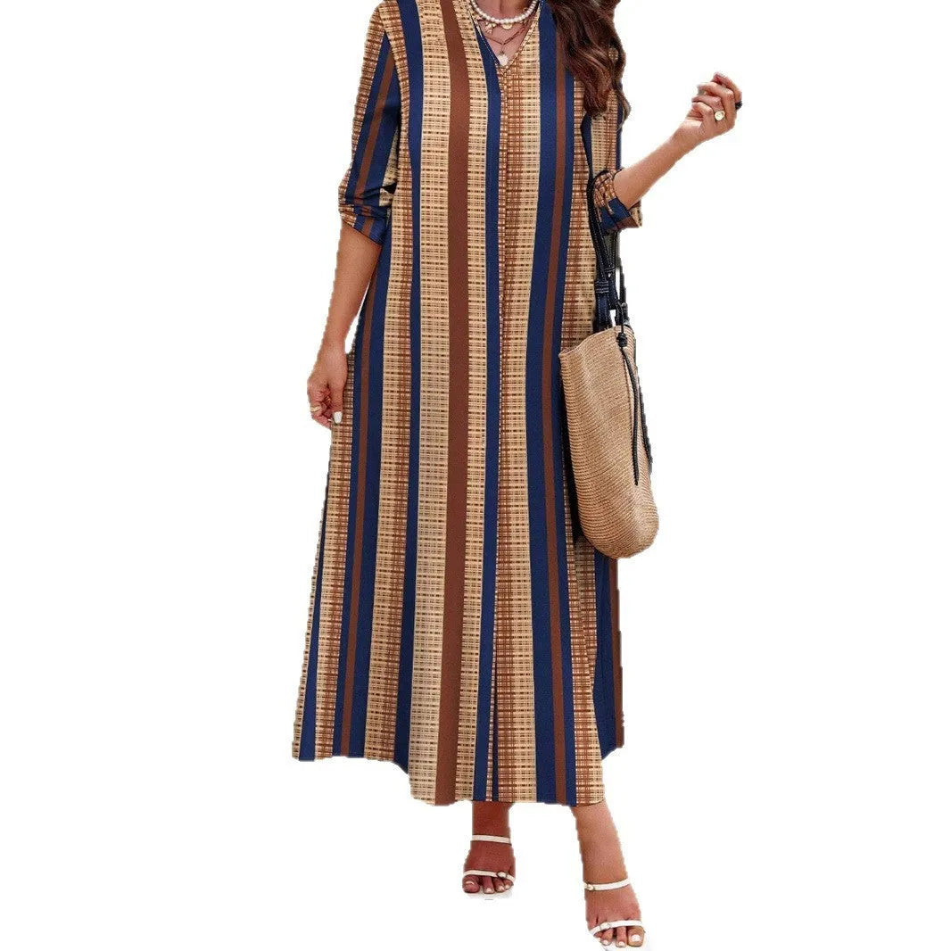 Women's camel coloured knitted A-line dress with vertical stripes and V-neck design