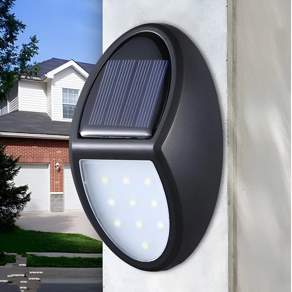 Black rectangular solar wall light with solar panel and LED illumination
