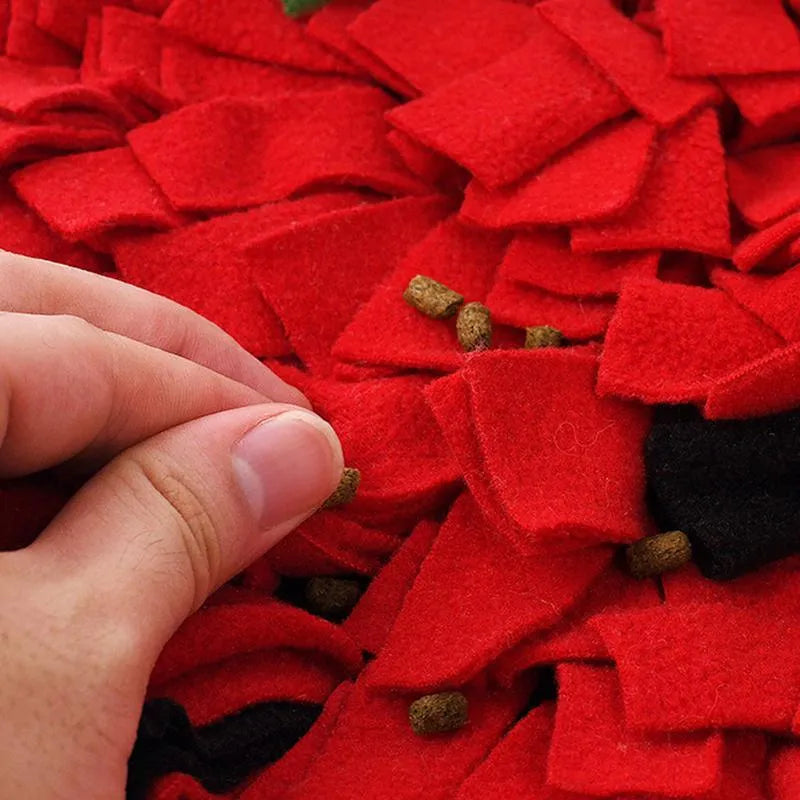 Red and green strawberry-shaped pet foraging mat for dogs and cats with multiple hiding spots