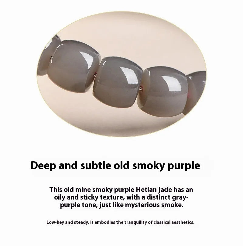 Natural smokey violet Hetian jade straight cut bead bracelet on a wrist