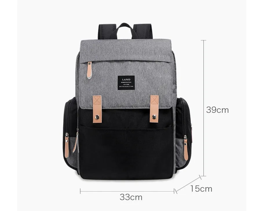 LAND Mommy large capacity oxford cloth diaper backpack with changing mat in beige colour.