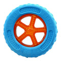 Three floating dog toys: a blue squeaky ball, a red barbell, and an orange tyre on a blue background.
