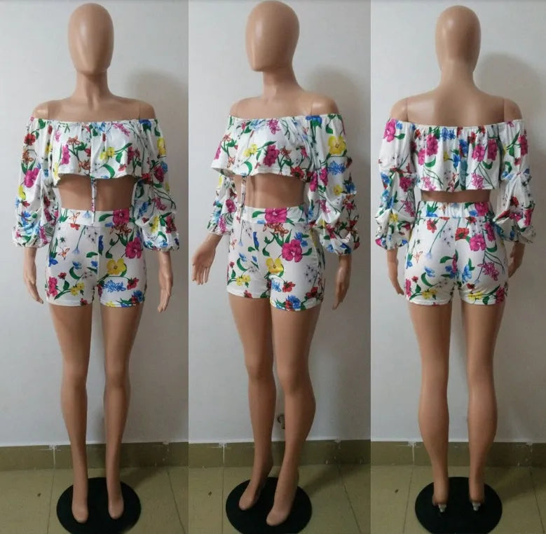 Women's multicolour digital print two-piece set with textured pile sleeves on the top and matching shorts.