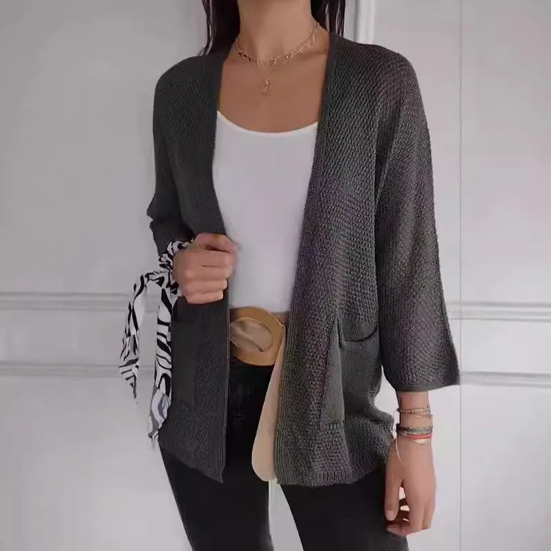 Women's waffle pattern cardigan coat in army green with nine-quarter sleeves and pocket details