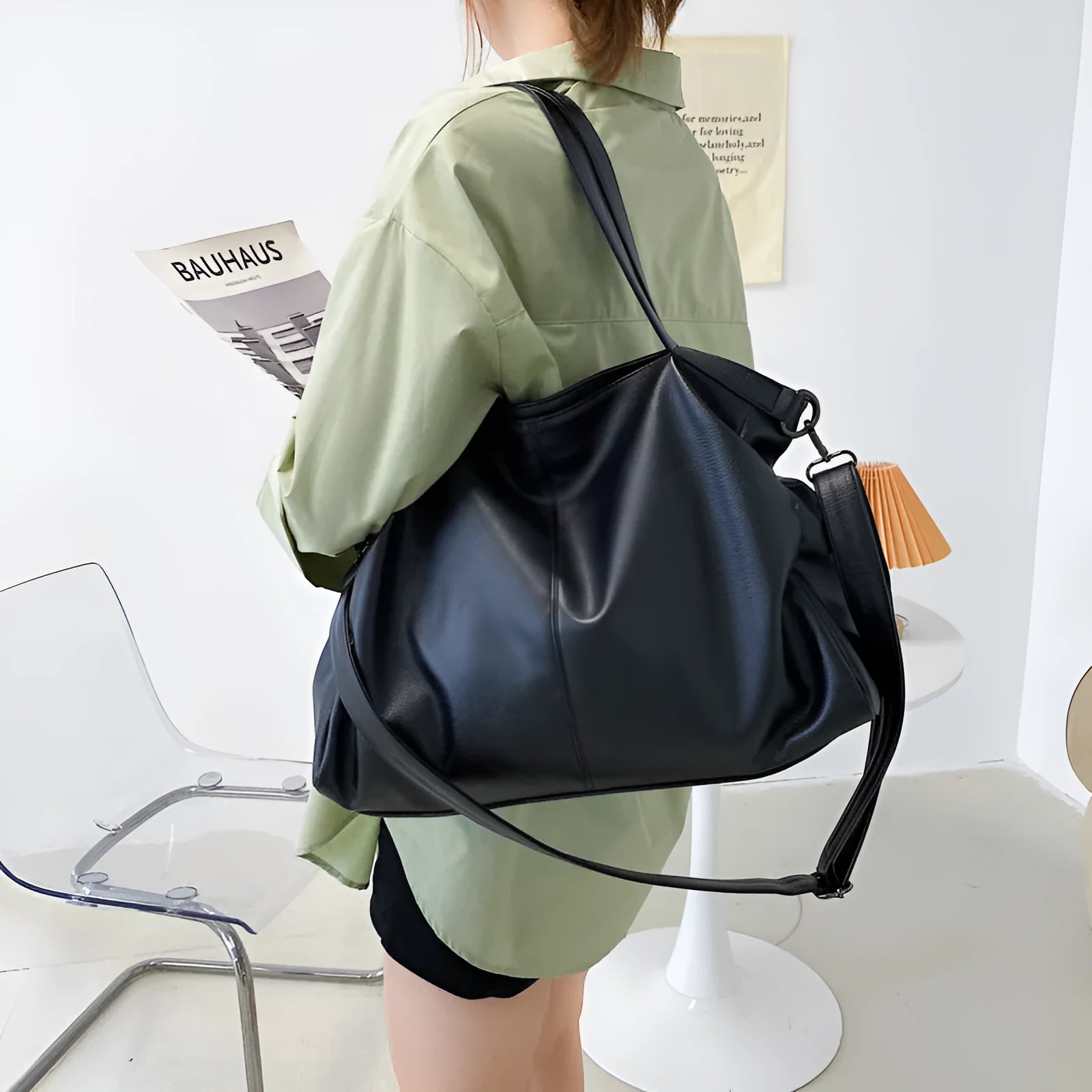 Large soft surface PU messenger bag in a horizontal square tote style with a shoulder strap.