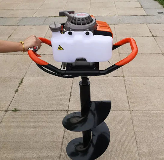 Portable single-person gasoline hole digger for fruit tree fertilization, shown with engine and digging attachment