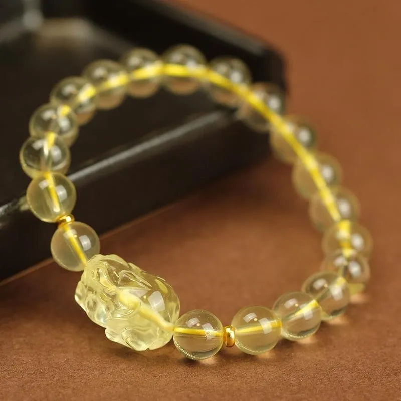 Yellow leather cord Pi Xiu bracelet with artificial crystal charms in simple Chinese style