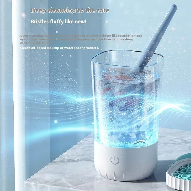 White plastic electric makeup brush cleaner with rechargeable battery and USB cable