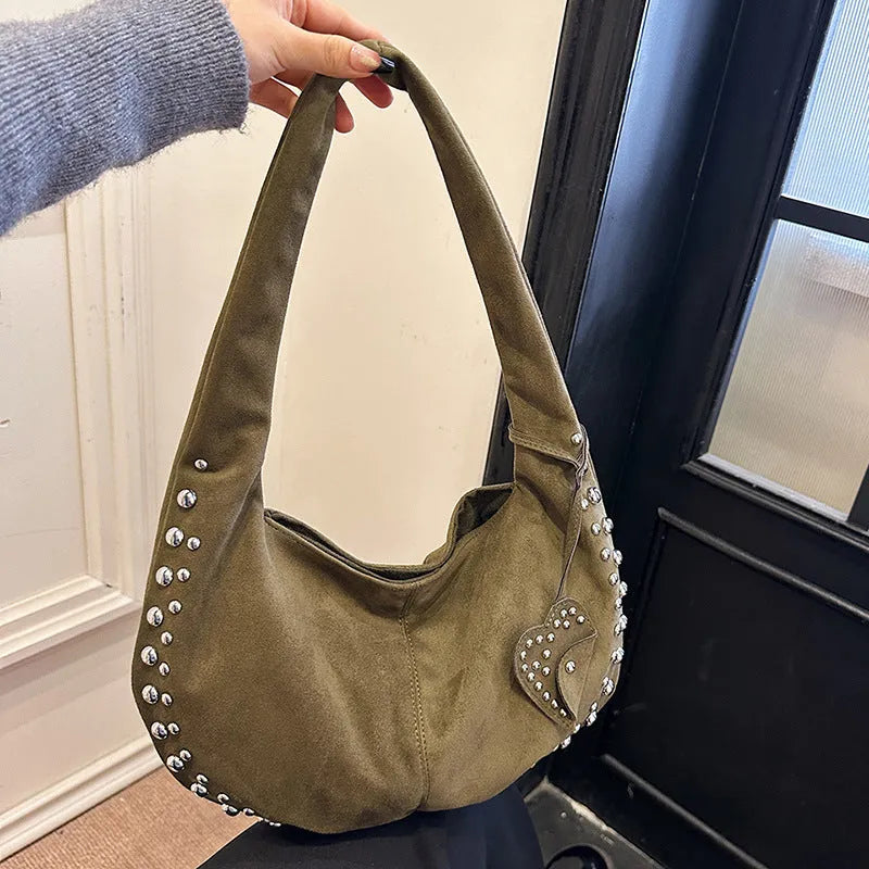 Soft plush retro style casual tote handbag for women shown in available colours.