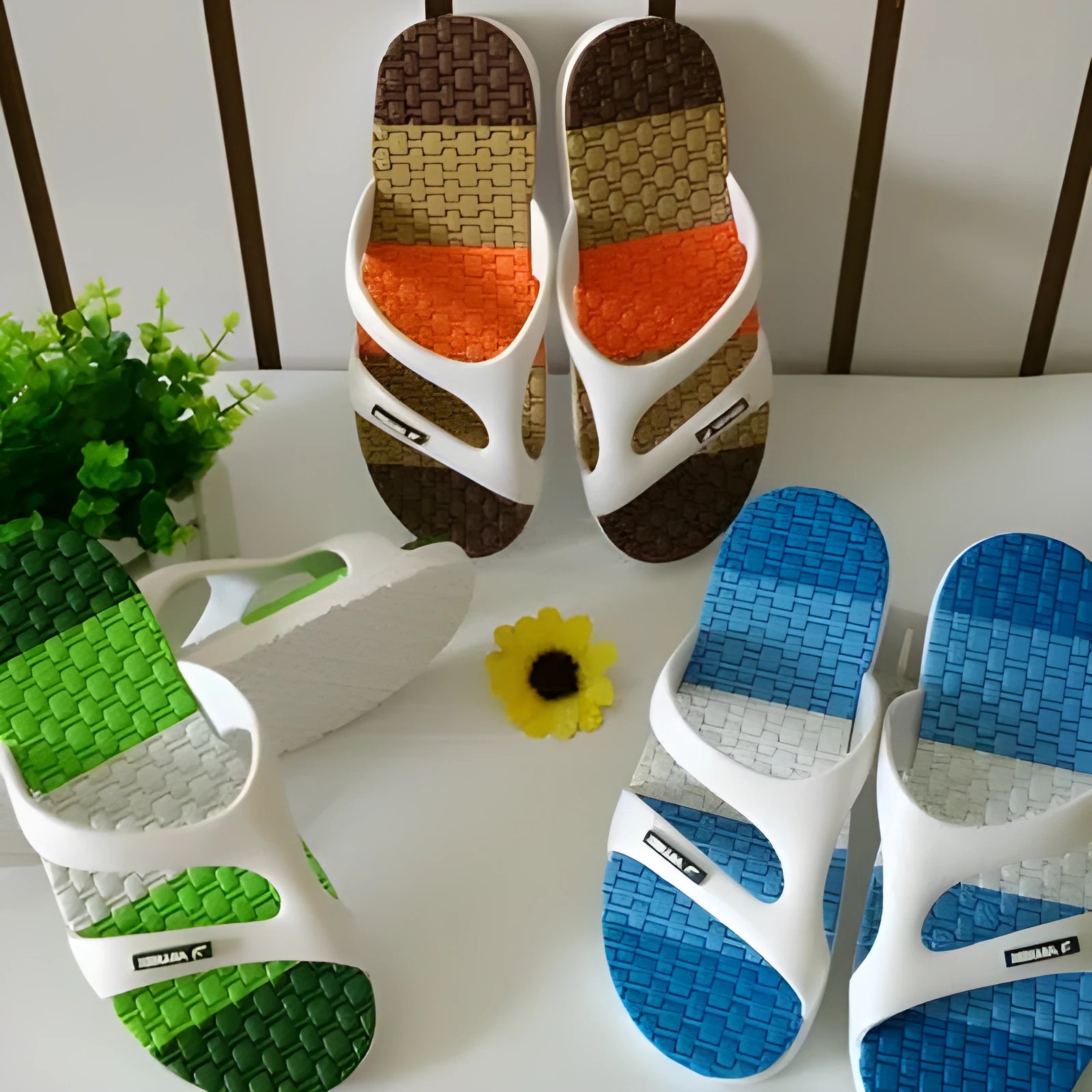 Men's blue summer home slippers with open toe and cotton-linen style upper on a balcony floor