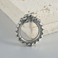 Pair of large stainless steel geometric dragon earrings with antique silver finish and alloy fittings.