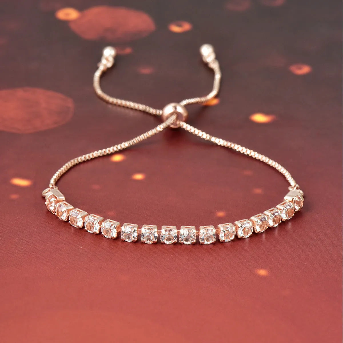 Micro-studded claw chain simple bracelet in metallic finish with round geometric studs on unisex wrist