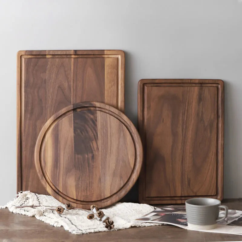 Black walnut wood cutting board with juice groove and side handle