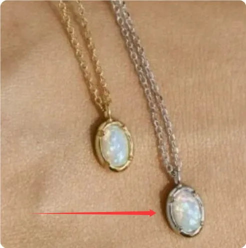 Oval geometric pendant necklace with jelly opal stone in silver plating, shown in golden and white gold colour options.