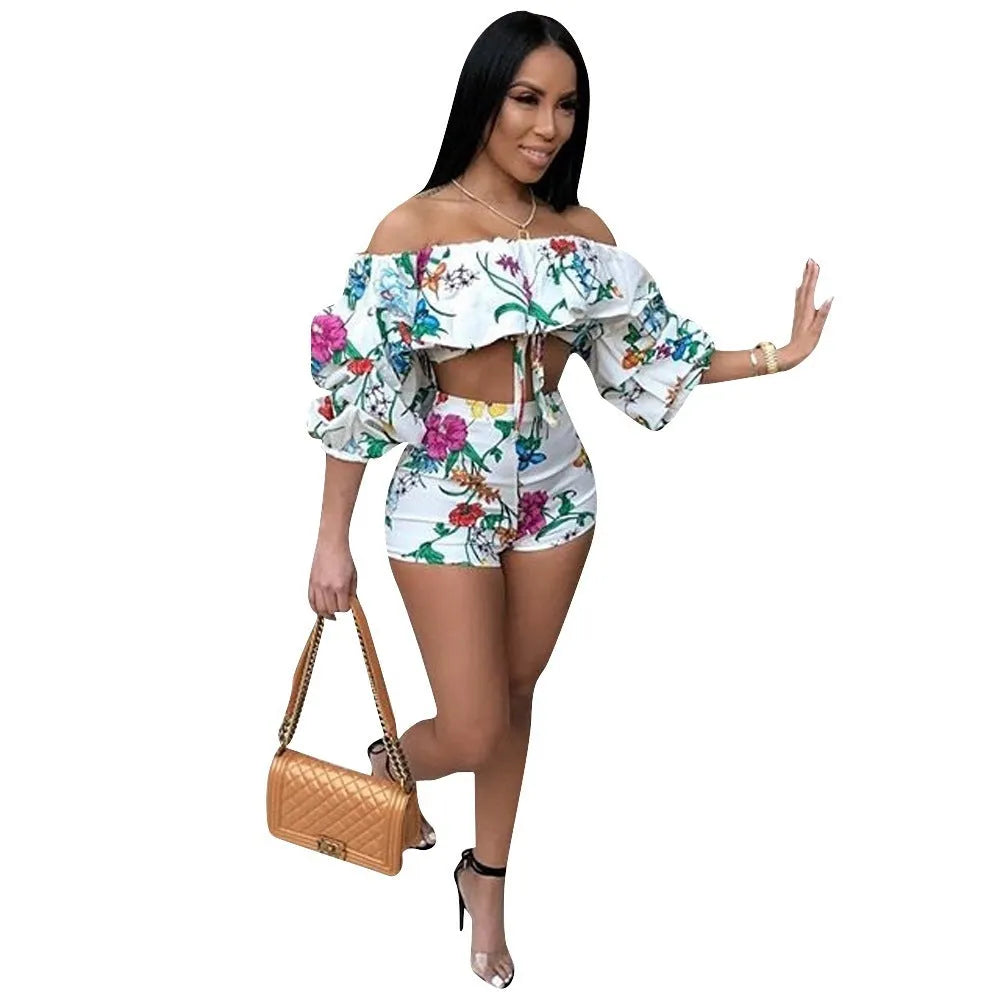 Women's multicolour digital print two-piece set with textured pile sleeves on the top and matching shorts.