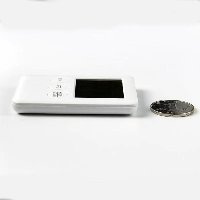 Digital kitchen timer with magnetic back in black and white colour options showing countdown display