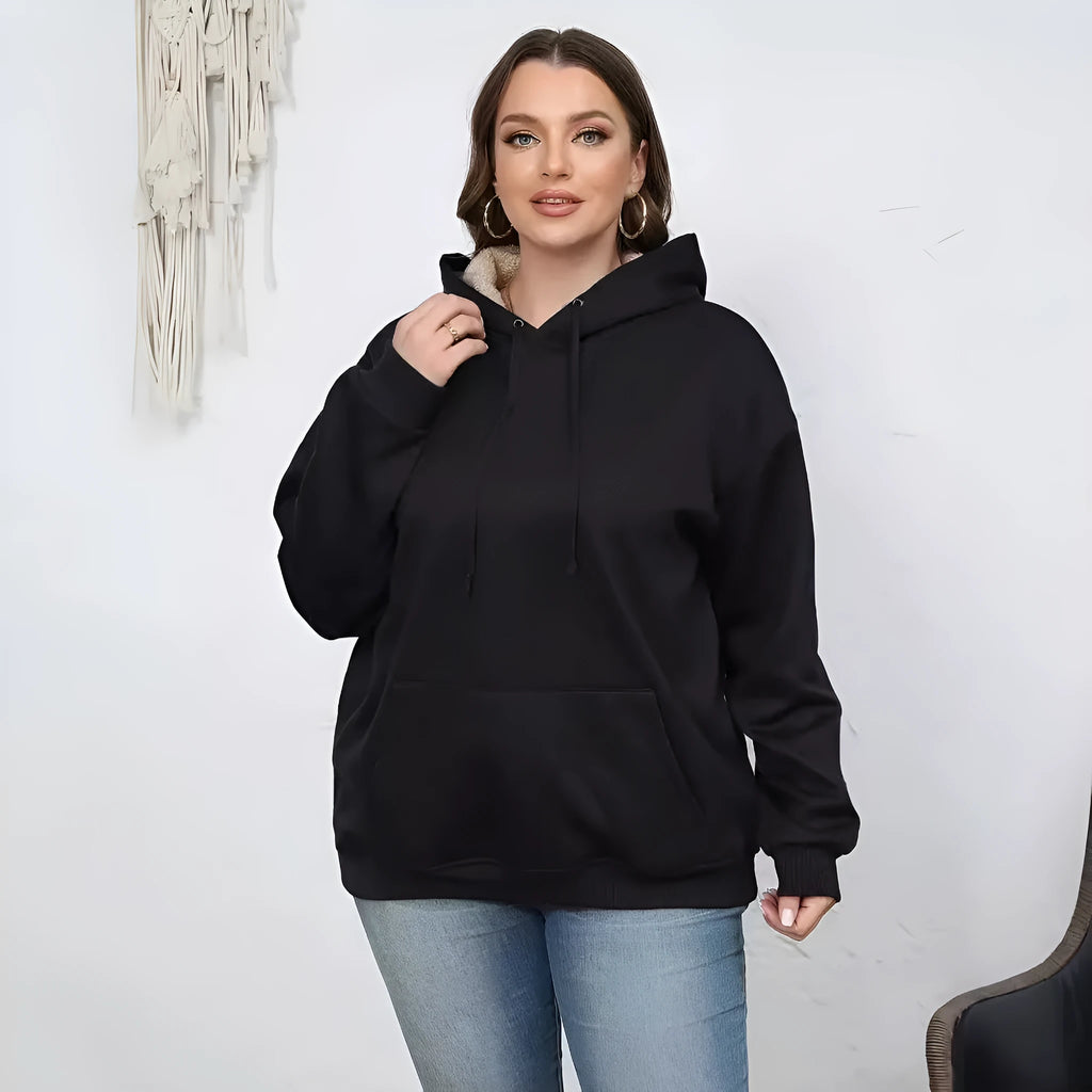 Women's loose fit hooded sweater with front pockets in thick polyester fleece
