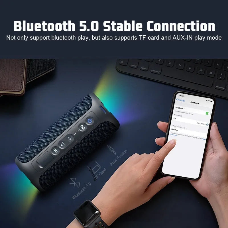 Black and blue fabric Bluetooth speaker with LED illumination showing 40W output and waterproof features