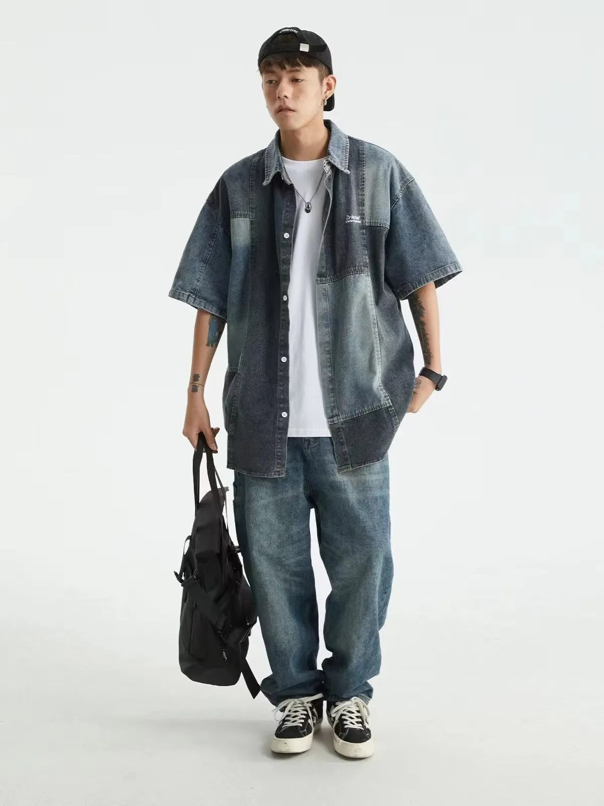 Blue Japanese-style men's denim shirt with retro washed stitching and loose cardigan fit.