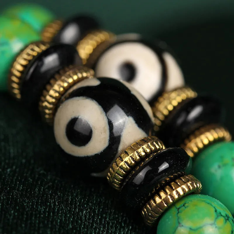 Natural turquoise bracelet with 108 round 8mm beads on a white background