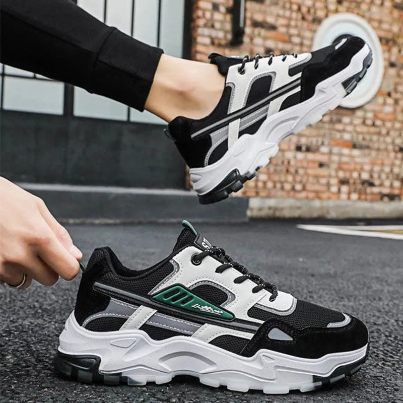 Black and white men's lace-up mesh sneakers with thick rubber sole for outdoor running