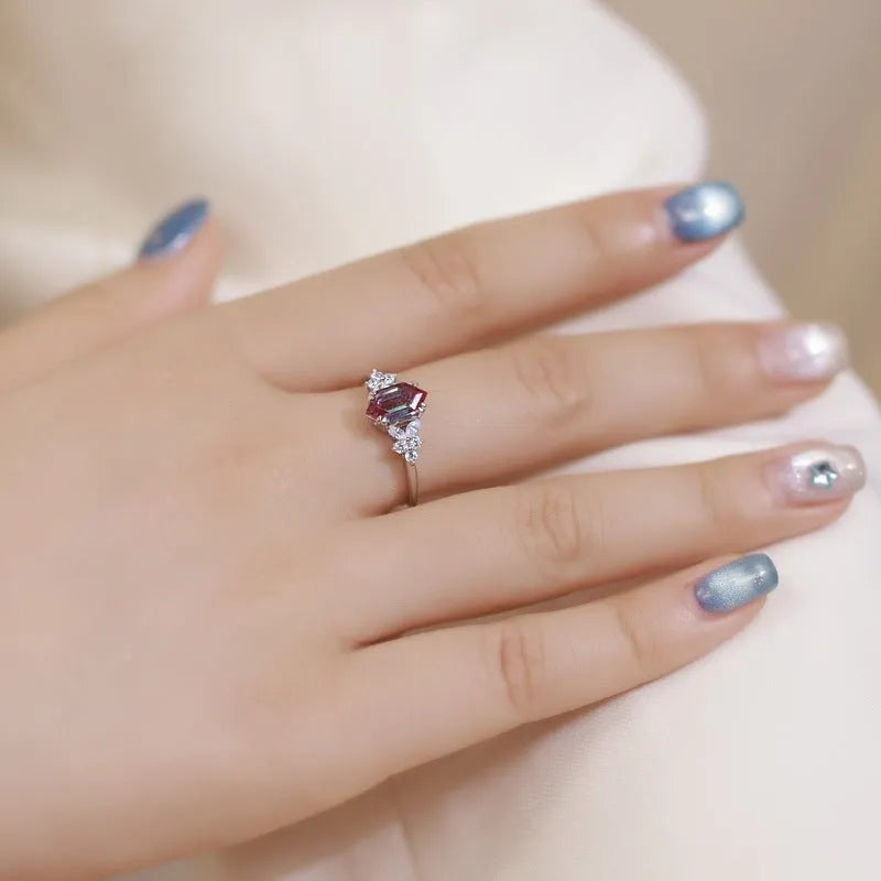 Women's Alexander stone ring with silver electroplated geometric band on neutral background