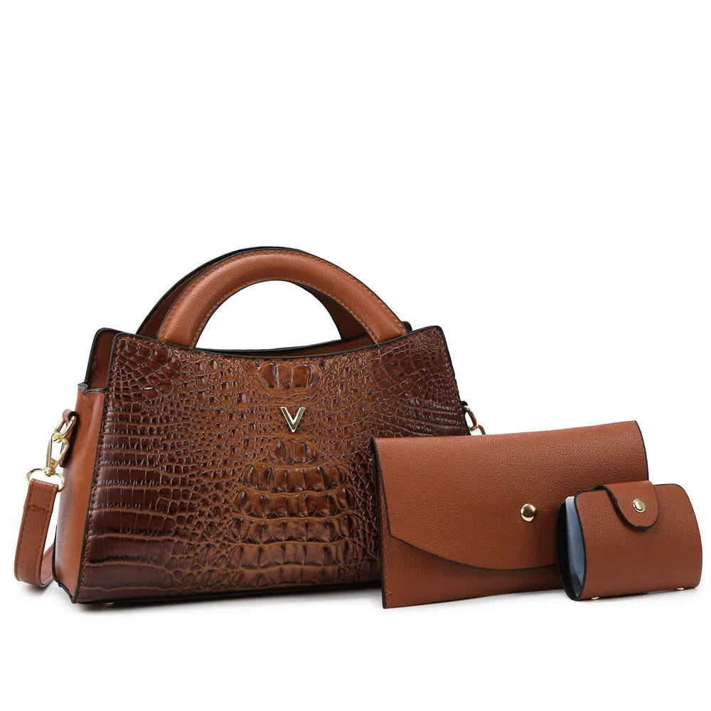 Women's square black crocodile pattern PU crossbody bag with shoulder strap and external pocket.