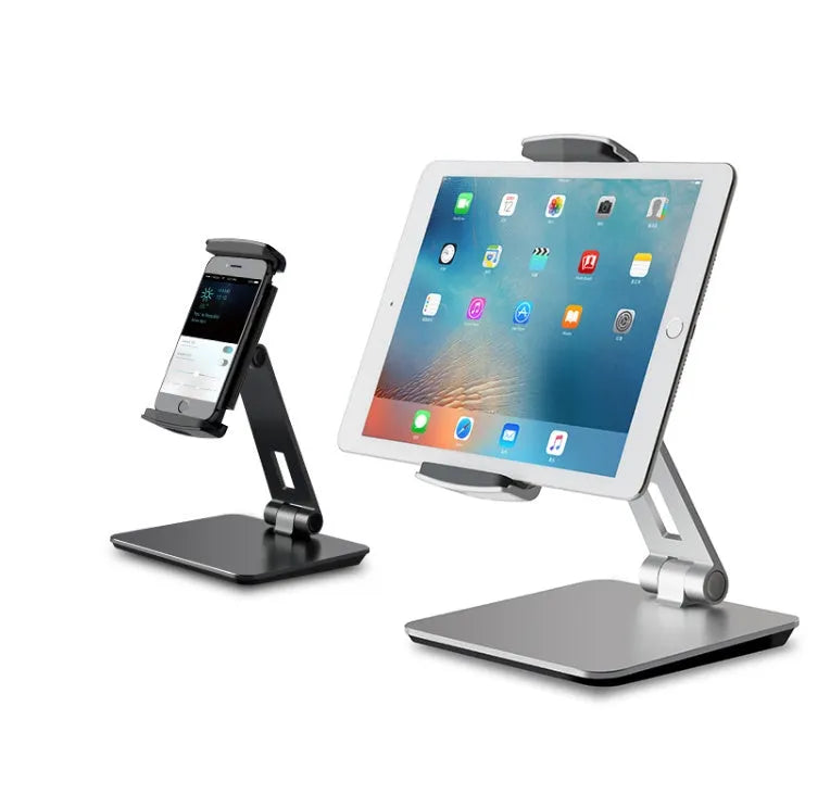 Silver folding aluminium phone and tablet stand with 360-degree rotation on desktop