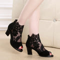 Women's black lace gladiator sandals with square heel and zip closure