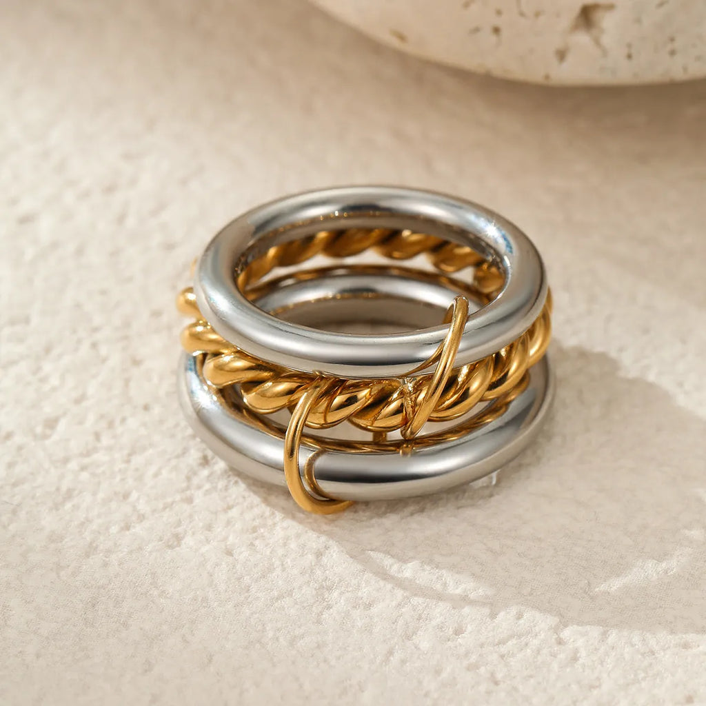 Stacked stainless steel rings with 18K gold plating in free size for women