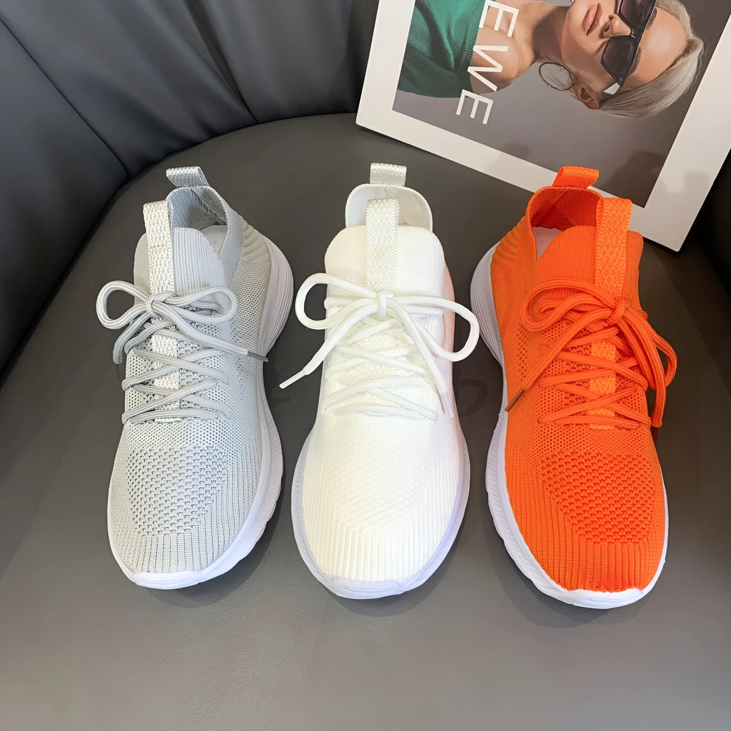 Women's breathable mesh running shoes in three colour options with flyknit upper and rubber sole