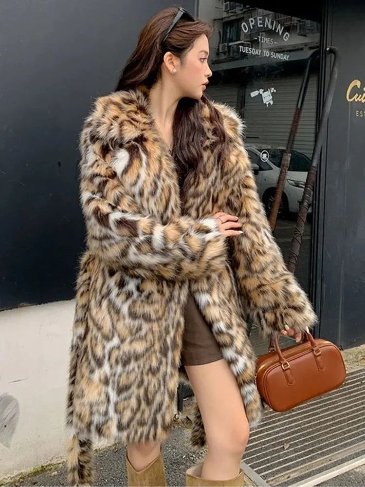 Faux fur coat with fur collar available in mid-length or long style with pockets