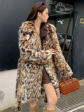 Faux fur coat with fur collar available in mid-length or long style with pockets