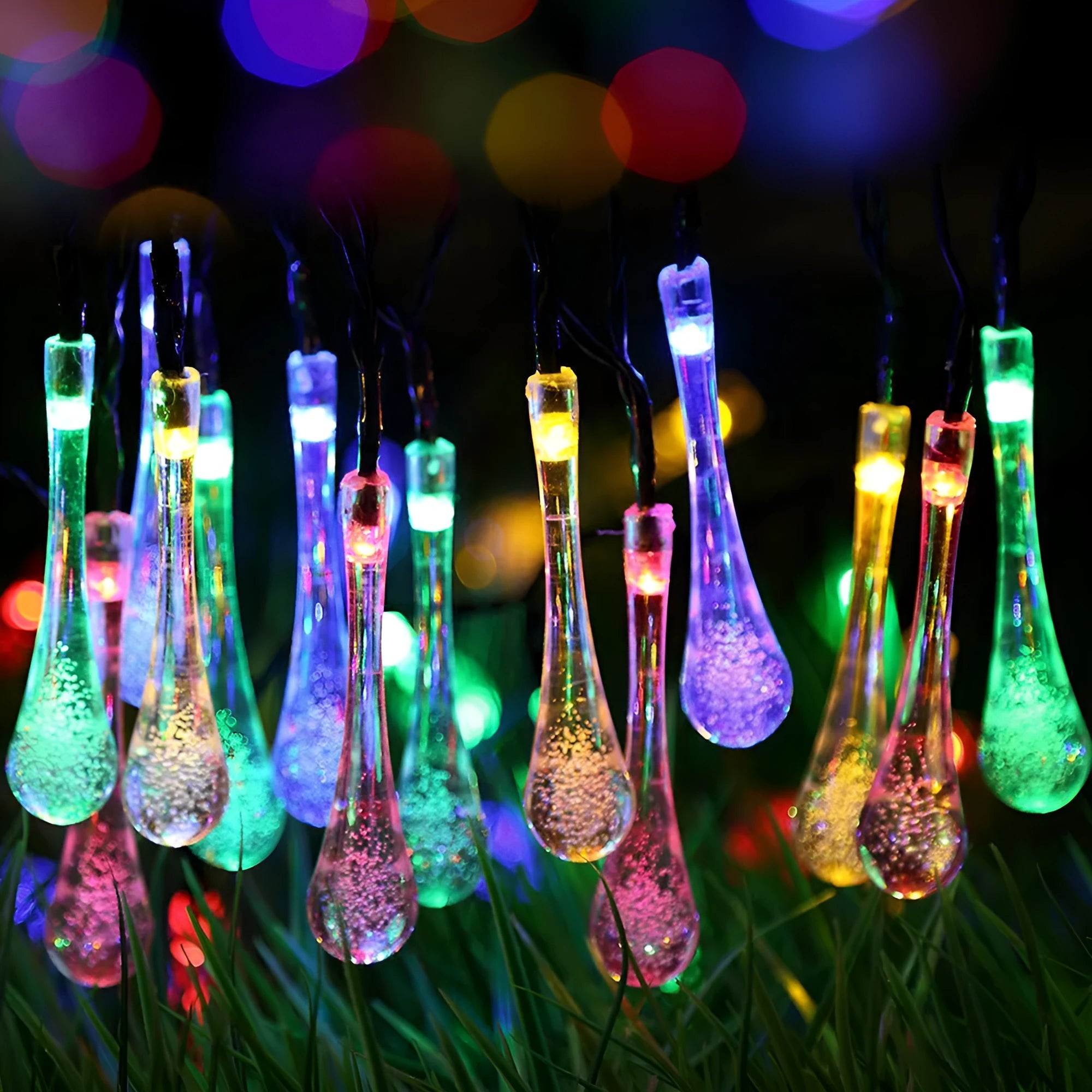 6.5 metre solar LED string lights with bubble drops pendants decorating an outdoor fence