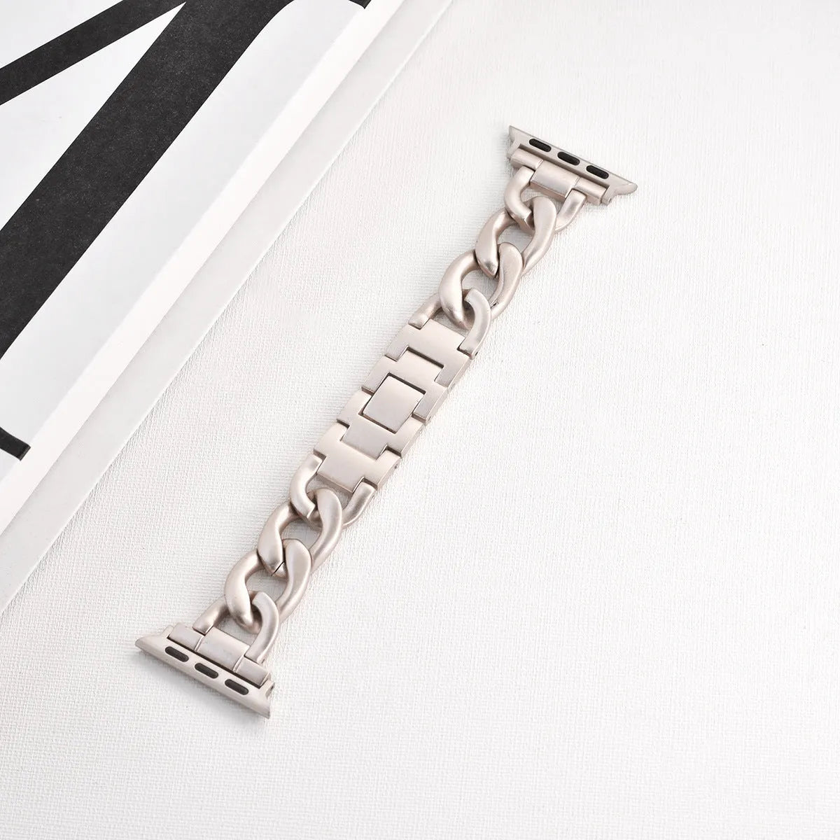 Silver denim chain link metal strap for Apple Watch with 22mm lug width on a 41mm case.