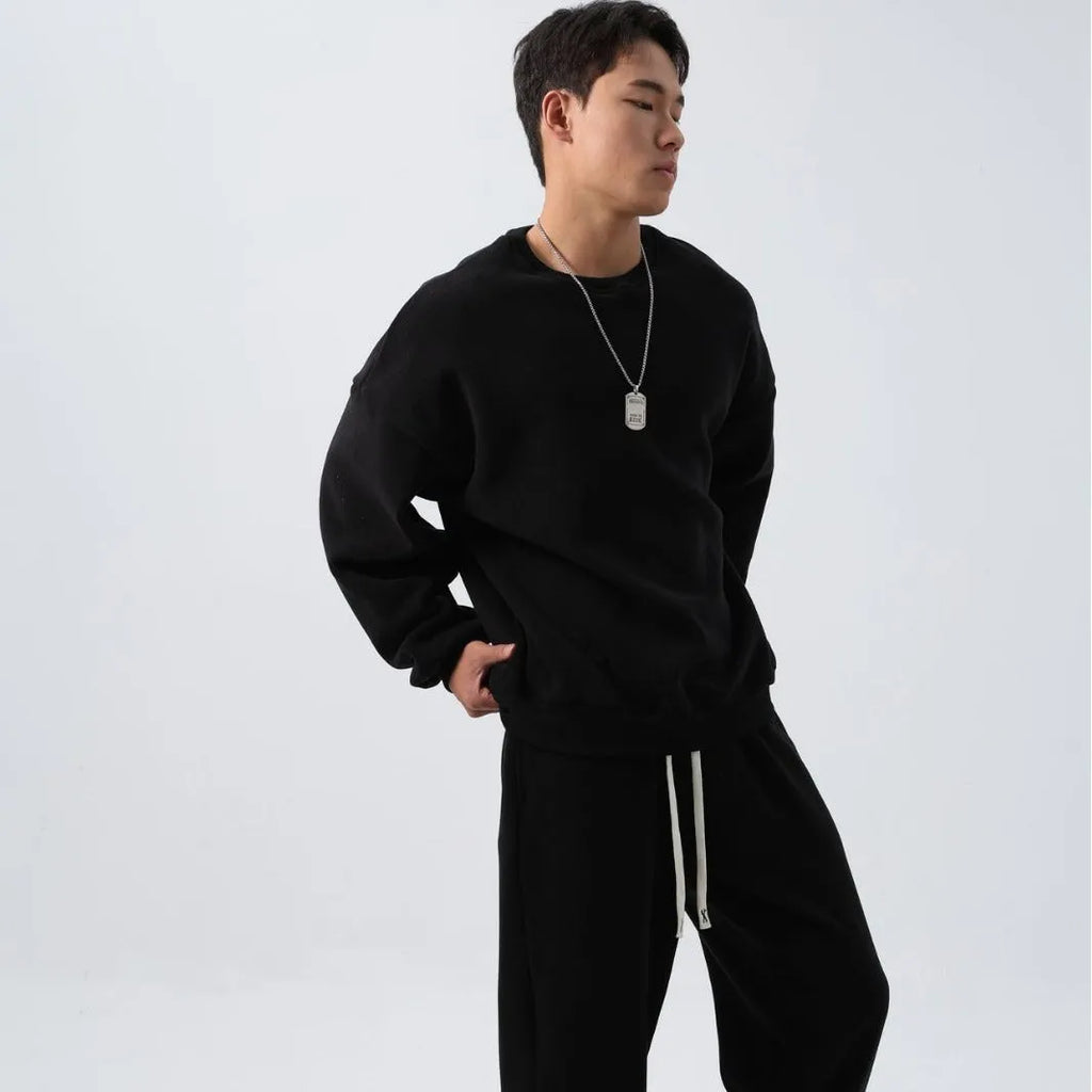 Men's polar fleece winter sports suit set showing crew neck coat and padded trousers in double-sided fleece fabric