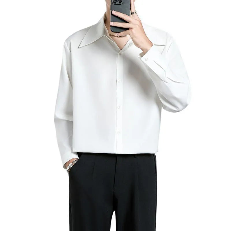 Men's loose non-iron polyester shirt in black and white, front view, with casual styling
