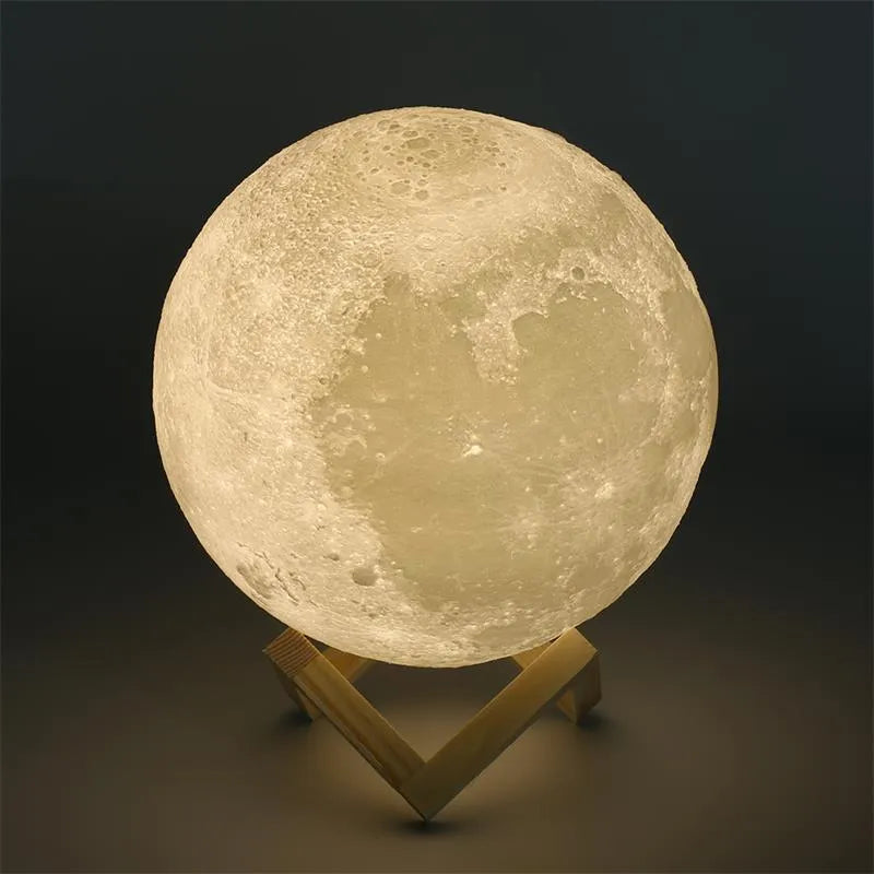 3D printed white moon lamp with detailed craters on a dark background, showing touch ring at base.