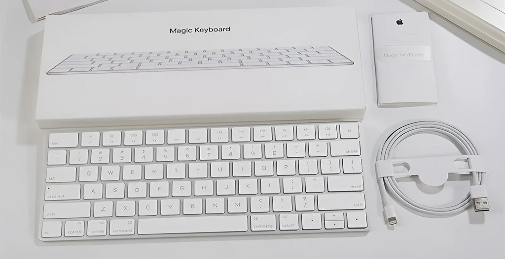 White Apple Bluetooth wireless keyboard with ultra-thin metal construction and multimedia keys