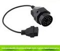 BMW OBD2 diagnostic adapter cable showing 20-pin connector and standard 16-pin OBD2 connector